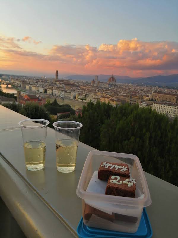 Gorgeous pink sunset at Piazzale Michelangelo with birthday brownies and prosecco